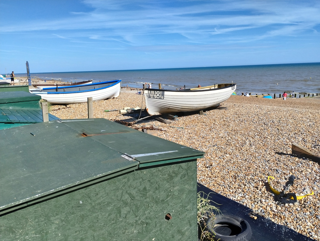 boat on a beach shot on Motorola Moto G82
