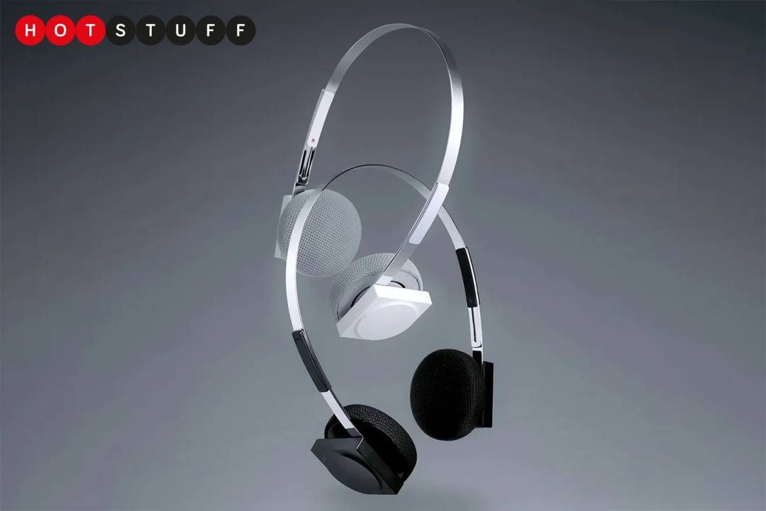 Two pairs of KM5 Lightwear Headphones Hp1 entwined on a grey background