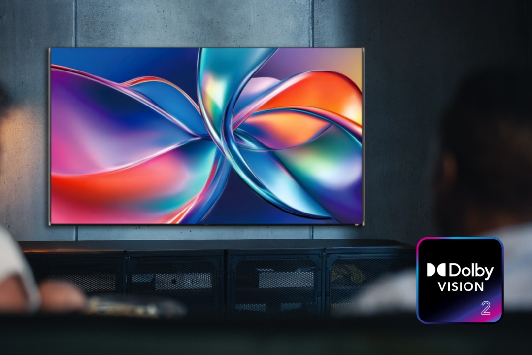 Dolby Vision 2 on a TV in front of people sat on a sofa